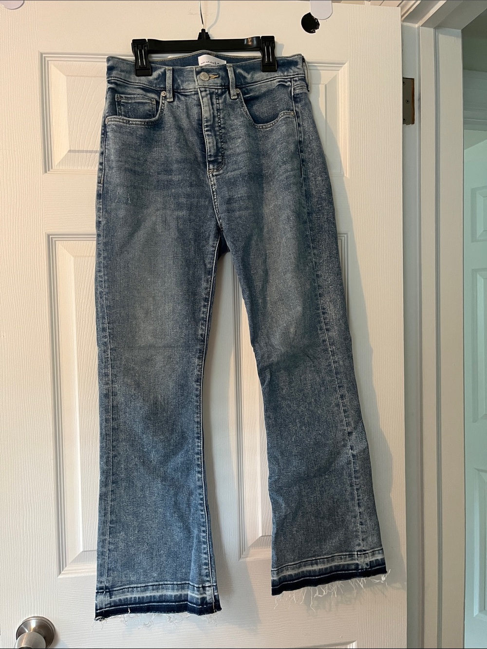 Ann Taylor Loft Women’s Flared Leg Jeans in Faded Blue